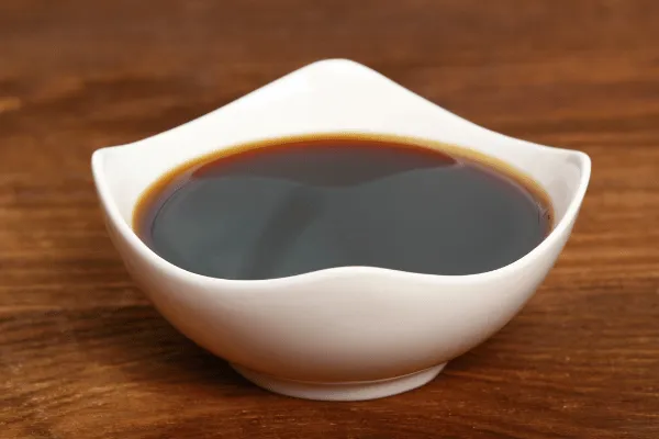 Homemade browning sauce, a dark caramelised sugar syrup