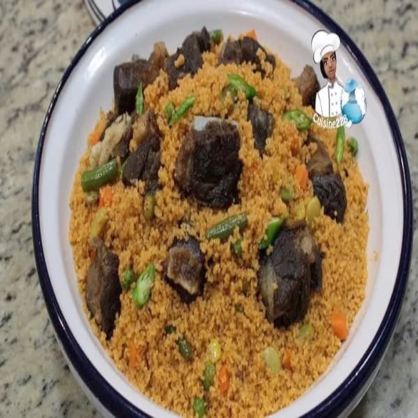 Jollof couscous, North African couscous cooked in a West African tomato and pepper base