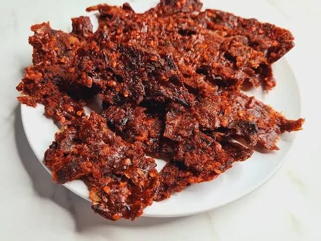Kilishi, Northern Nigerian spiced dried beef coated in a groundnut and pepper paste