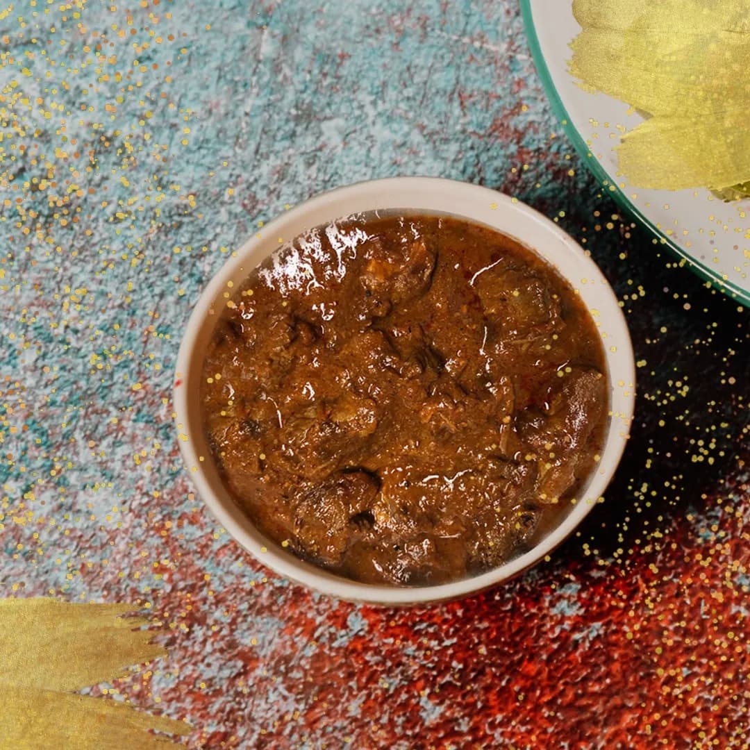 Namibian venison cooked in a spiced yoghurt curry with tomato and served with rice