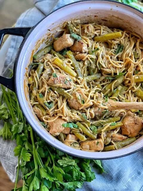 Nigerian amasi spaghetti, pasta in a tomato sauce enriched with fermented milk
