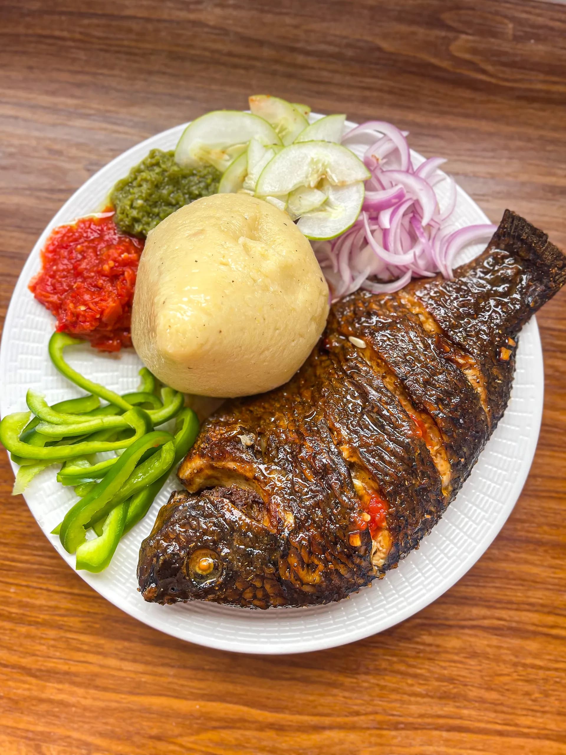 Oven baked tilapia, Ghanaian marinated fish with garlic, ginger and chilli