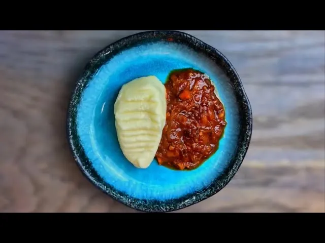 Pap and sous, South African maize porridge served with a tomato and onion gravy