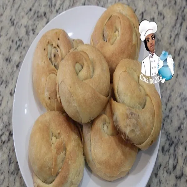 Stuffed rolled pastries filled with spiced minced meat, baked golden
