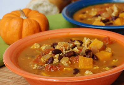 A soup of pumpkin, sweet potato, turkey and kidney beans