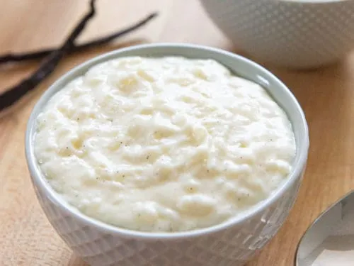 Rice pudding with raisins, cinnamon and nutmeg served warm