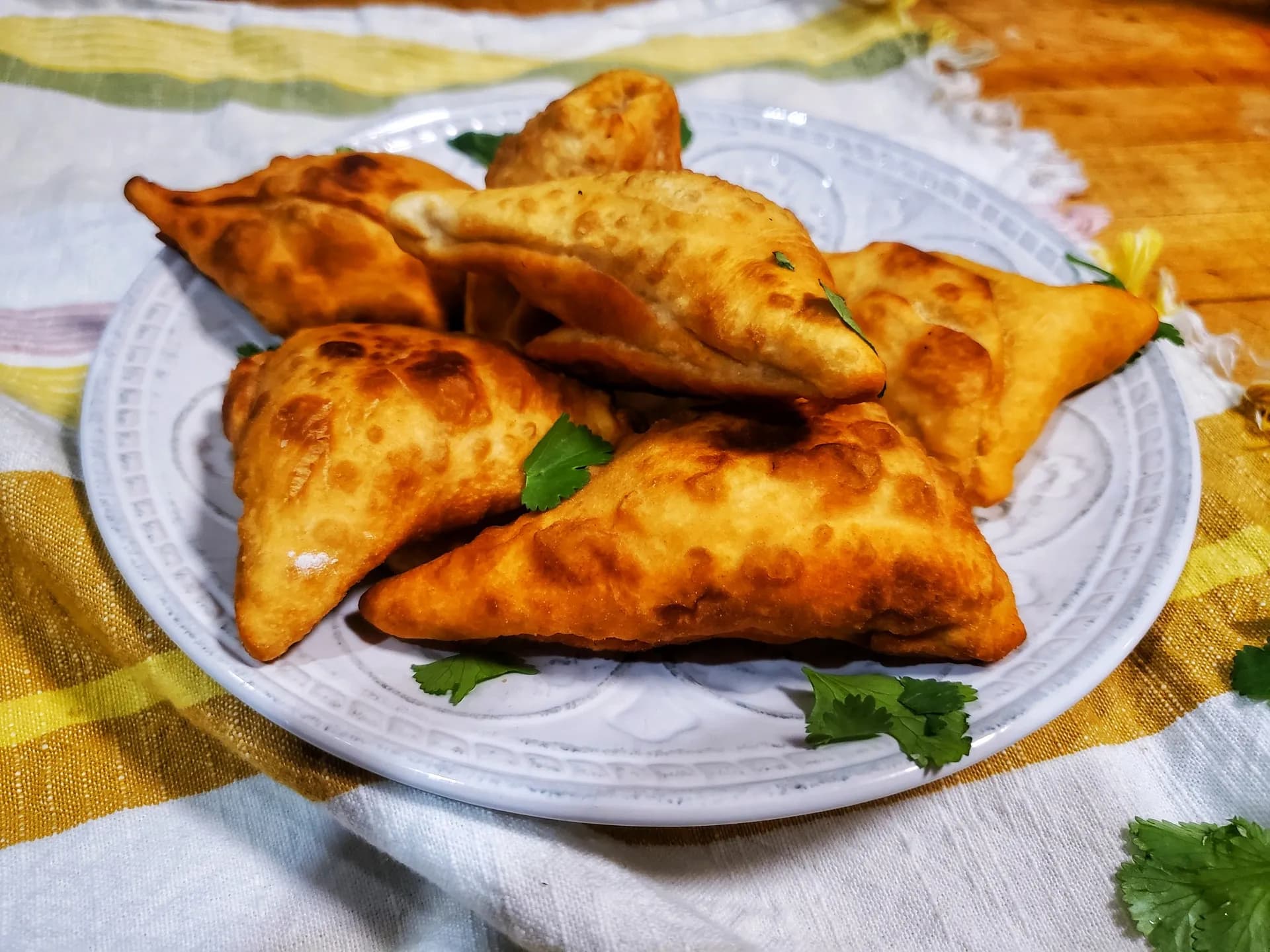 Sambusas, Somali fried triangular pastries filled with spiced beef