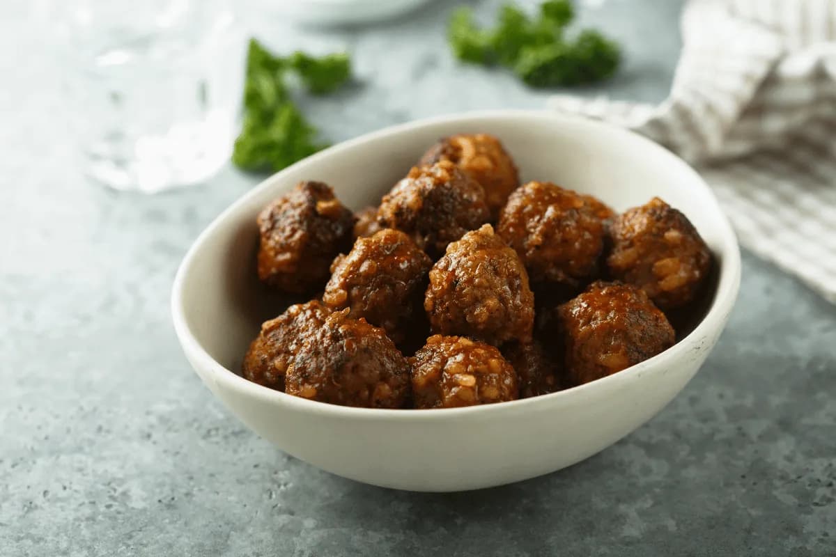 Sardine meatballs cooked in a spiced Moroccan tomato sauce