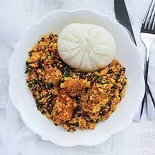 Semovita, a Nigerian wheat semolina swallow, shaped smooth and served with soup