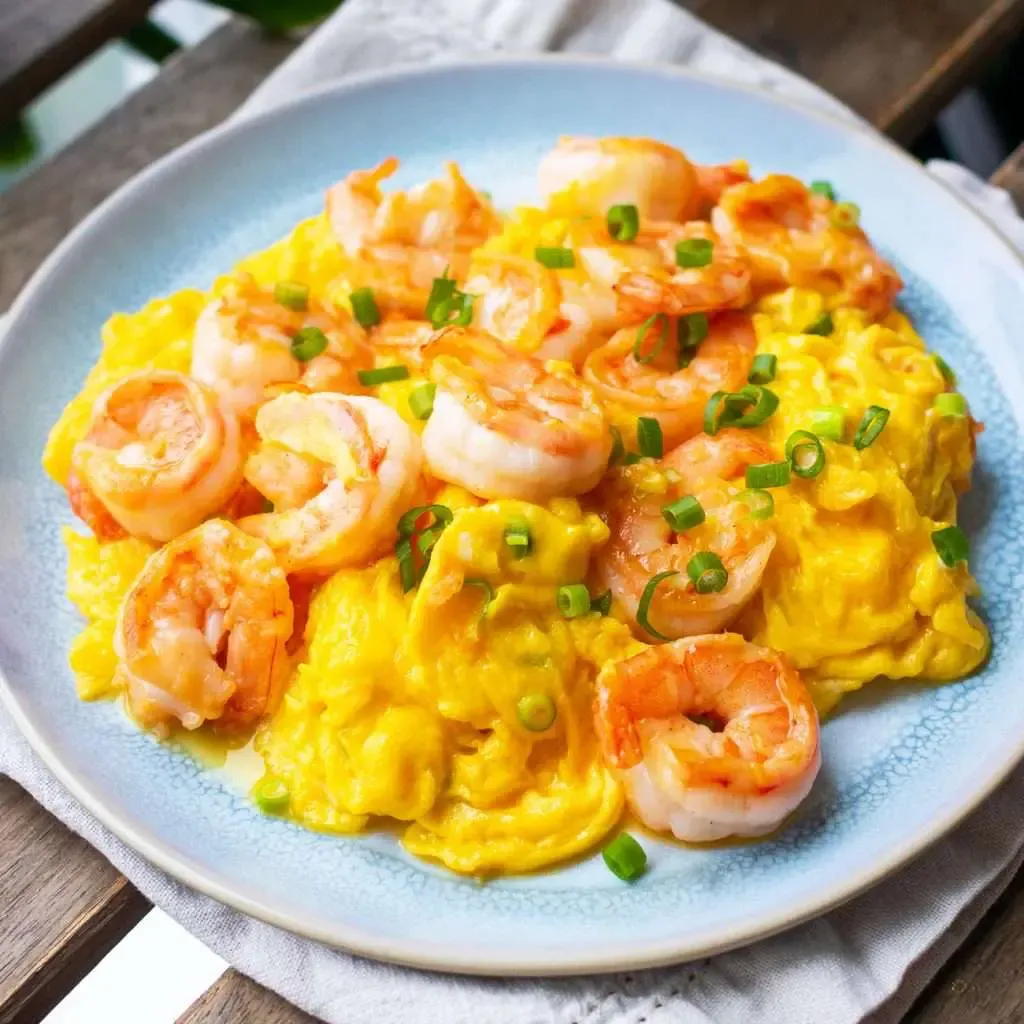 Shrimp and egg stir-fry with soft scrambled egg and scallions