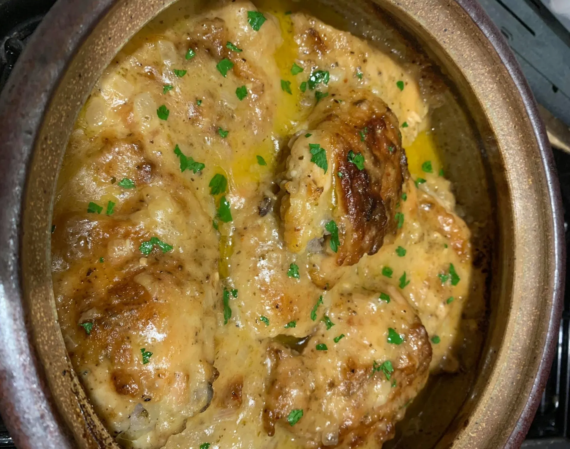 Smothered chicken in an onion gravy