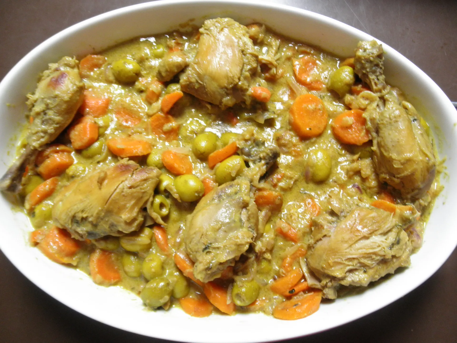 Tajine zitoun, Algerian chicken cooked with green olives, carrot and onion