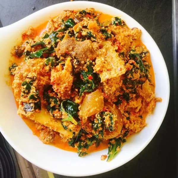 Uziza egusi soup, Nigerian melon seed soup with uziza leaves, assorted meat and smoked fish